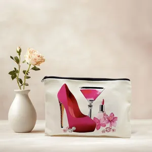 Detailed view of canvas cosmetic pouch featuring chic pink high heel and flower print design.