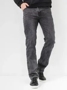 Men's washed black slim straight jeans detail shot, classic denim trousers for daily wear.