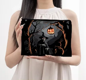 Halloween theme zipper cosmetic bag, spooky pumpkin skull print, portable fabric clutch.