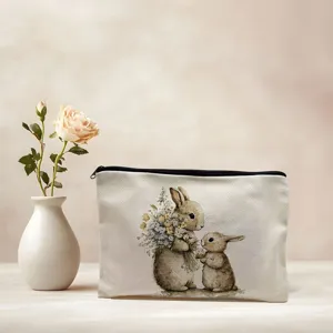 Linen cosmetic bag with watercolor rabbit illustration, cute zipper storage pouch detail.