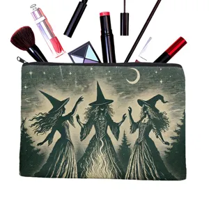 Vintage witch print detail on canvas cosmetic pouch, featuring secure zipper closure for daily use.