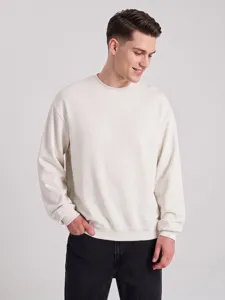 Men's blank oversized crewneck sweatshirt detail shot showing comfortable drop shoulder design.