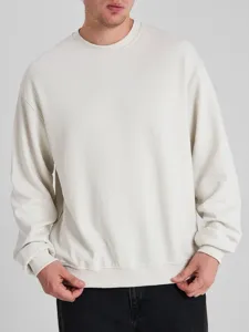 Men's blank oversized crewneck sweatshirt in off-white featuring a casual drop shoulder fit.