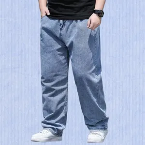 Close-up view of casual loose-fit denim jeans showing fabric texture and straight leg cut.