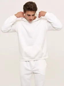 Close-up detail of a plain white men's hooded sweatshirt featuring a front pocket design.