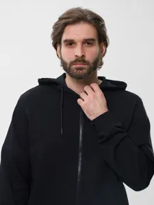 Men's fleece-lined black hooded zip-up sweatshirt detail, cozy autumn and winter casual jacket.