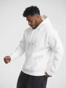 Close-up detail of the white hoodie, showcasing the soft fabric texture and hoodie drawstring.