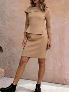 Chic commute peplum dress with a unique shawl collar and 3/4 sleeves. Elegant pencil midi dress.