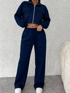 Navy blue zip-up cropped jacket and high-waist wide-leg pants set, comfortable casual wear.