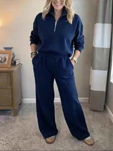 Comfortable navy blue half-zip sweatshirt and wide leg trousers lounge set for women autumn.