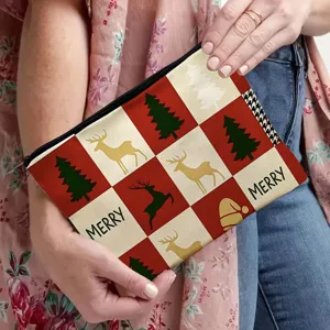 Christmas plaid zippered makeup bag detail, linen fabric with reindeer and tree print.