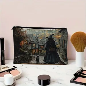 Detailed view of cosmetic pouch featuring vintage witch and town print, ideal for daily use.