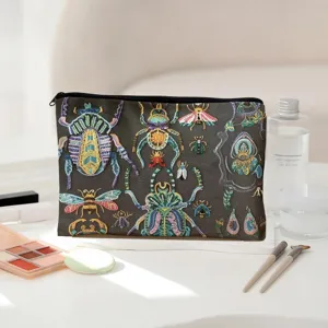 Canvas cosmetische tas met kralen insectenprint, perfect voor dagelijkse make-up opslag.