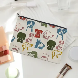Detailed view of the cute canvas makeup pouch featuring colorful stylized dog prints for daily use.