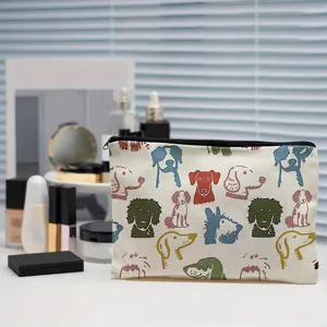 Canvas cosmetic bag with cute cartoon dog print, stylish zipper travel makeup pouch for daily use.