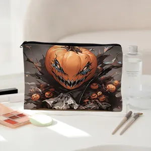 Halloween pumpkin print cosmetic bag detail shot, featuring zipper closure and spooky design.