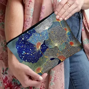 Canvas cosmetisch tasje met rits en ginkgopatroon, ideal voor dagelijkse make-up en kleine spullen.