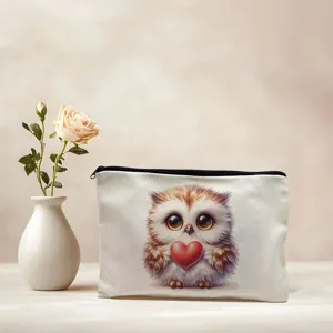 Detail shot of a cute owl print canvas cosmetic pouch, perfect for daily and travel use.
