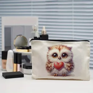 Cute owl print canvas makeup bag with zipper closure, perfect cosmetic pouch for daily use.