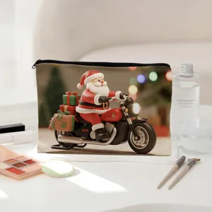 Close-up detail of the Christmas Santa Claus motorcycle print cosmetic bag on white table.