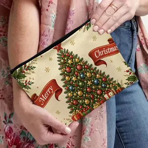 Detailed view of a festive canvas Christmas pouch with a tree print and zipper closure.