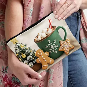Christmas canvas pouch cosmetic storage bag with cute gingerbread man and festive holiday print.