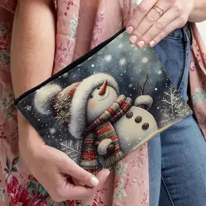 Detail-Nahaufnahme der schönen weihnachtlichen Schneemann-Print Kosmetiktasche für Reisen.