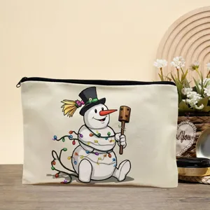 Leinwand Make-up Tasche Detail mit niedlicher Cartoon-Schneemann Grafik auf Holztisch.