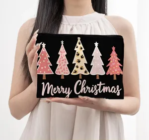 Detailed view of the large Christmas tree cosmetic bag, showing festive print and durable fabric.