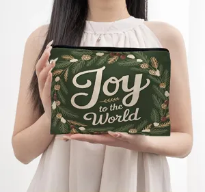 Trousse de maquillage de Noël avec un joli imprimé festif et une fermeture éclair.