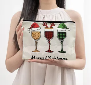 Detailansicht der weihnachtlichen Weinglas-Print Leinen Kosmetik- und Reise-Aufbewahrungstasche.