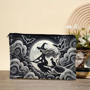 Canvas cosmetic pouch detail showing gothic witch and moon print design clearly.