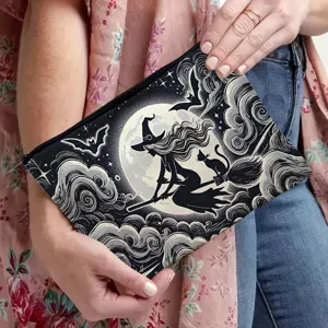 Detailed view of the canvas zipper makeup pouch with vintage witch and moon print design.