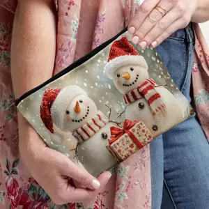 Detailed view of the Christmas snowman print makeup pouch with secure zipper and festive look.