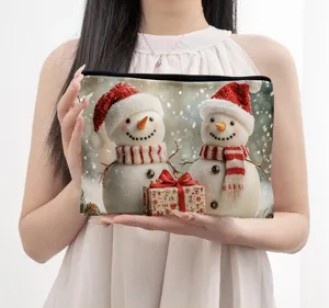 Christmas snowman printed zipper pouch detail showing festive holiday storage bag design.