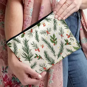 Christmas makeup pouch with pine branch and red berry print, polyester travel cosmetic storage bag.