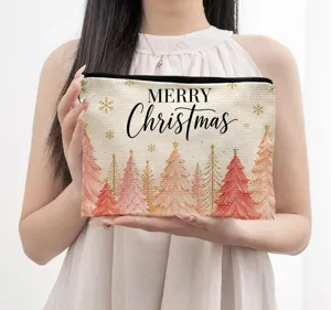 Christmas cosmetic bag detail, pink tree print canvas pouch, holiday storage organizer for travel.