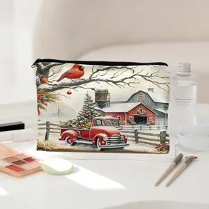 Close-up detail of the Christmas red truck pattern cosmetic pouch on clean white desk.