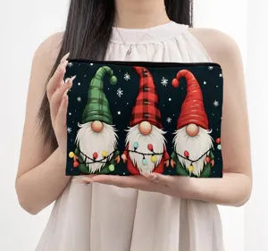 Trousse de maquillage portable avec imprimé de lutins de Noël, idéale pour le rangement de voyage.