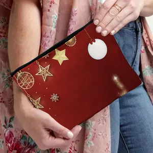 Christmas cosmetic bag with gold stars and snowflakes pattern, portable travel makeup pouch.