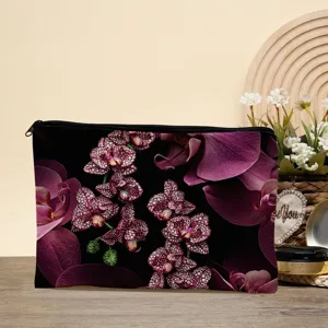 Vista dettagliata della borsa cosmetica con motivo a orchidea scura e cerniera resistente.
