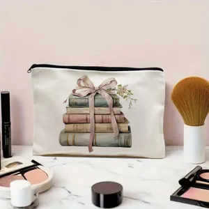 Canvas makeup bag with vintage book and bow print, portable cosmetic storage pouch for women.