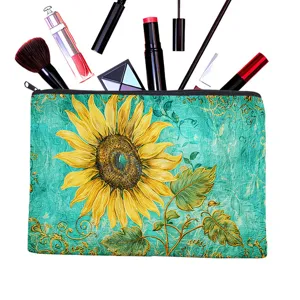 Gros plan sur la trousse de maquillage en toile avec motif tournesol et fermeture zippée.