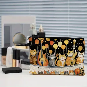 Detailed view of cosmetic makeup pouch featuring artistic cat and musical instrument prints.