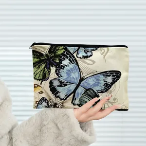 Stylish butterfly print cosmetic bag, large capacity portable makeup pouch for daily use.