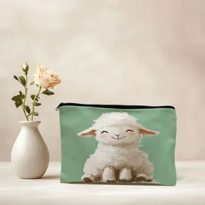 Close-up detail shot of the cute fluffy sheep print cosmetic pouch with smooth zipper.
