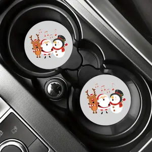 Detailed view of cute Christmas car coasters set, featuring snowman and reindeer in cup holder.
