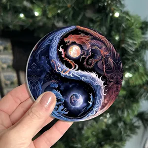 Detailed shot of round yin yang dragon silicone coaster, heat resistant table mat.