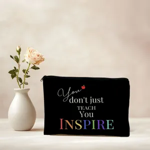 Detail view of black teacher appreciation makeup pouch featuring inspirational typography print.