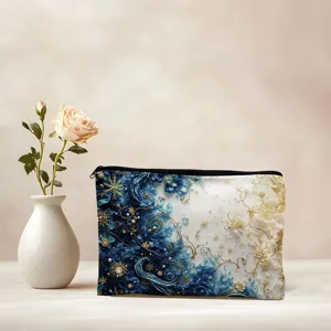 Trousse de toilette en toile au design abstrait or et bleu, pochette maquillage détail.